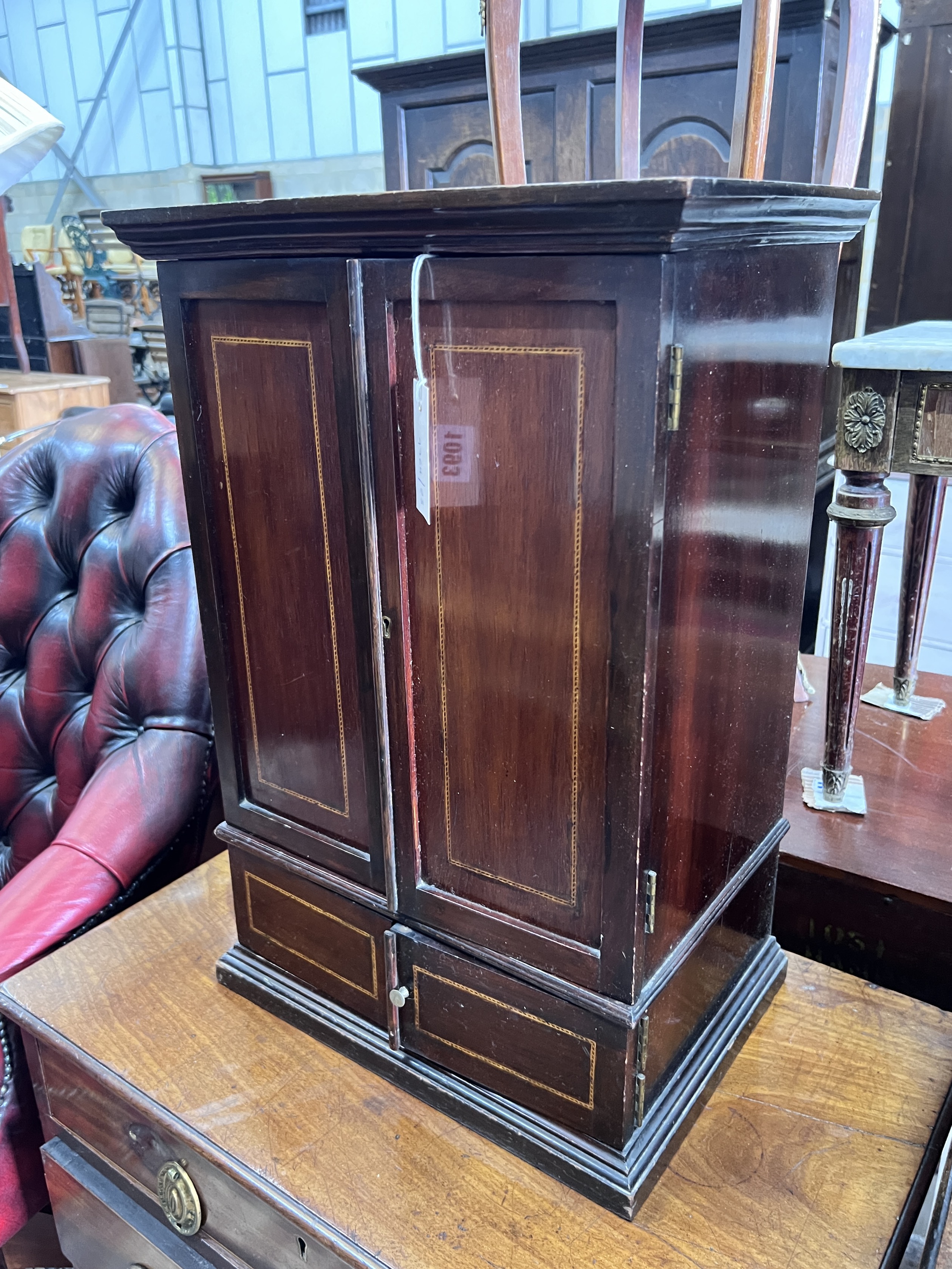 An Edwardian inlaid mahogany table top cabinet, width 39cm, depth 27cm, height 59cm